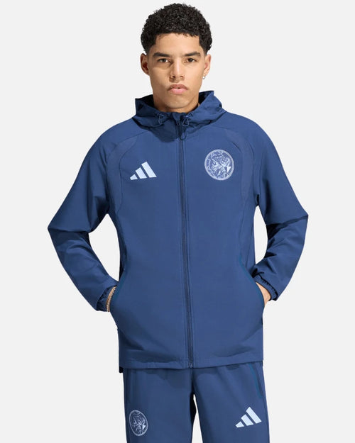 Veste Ajax Tiro Travel 2026/2027 - Bleu - Footkorner