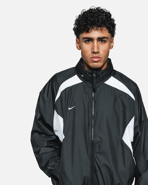 Chaqueta deportiva Nike FC Repel - Negro/Blanco - Footkorner