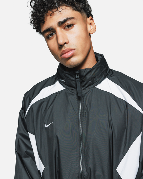 Chaqueta deportiva Nike FC Repel - Negro/Blanco - Footkorner