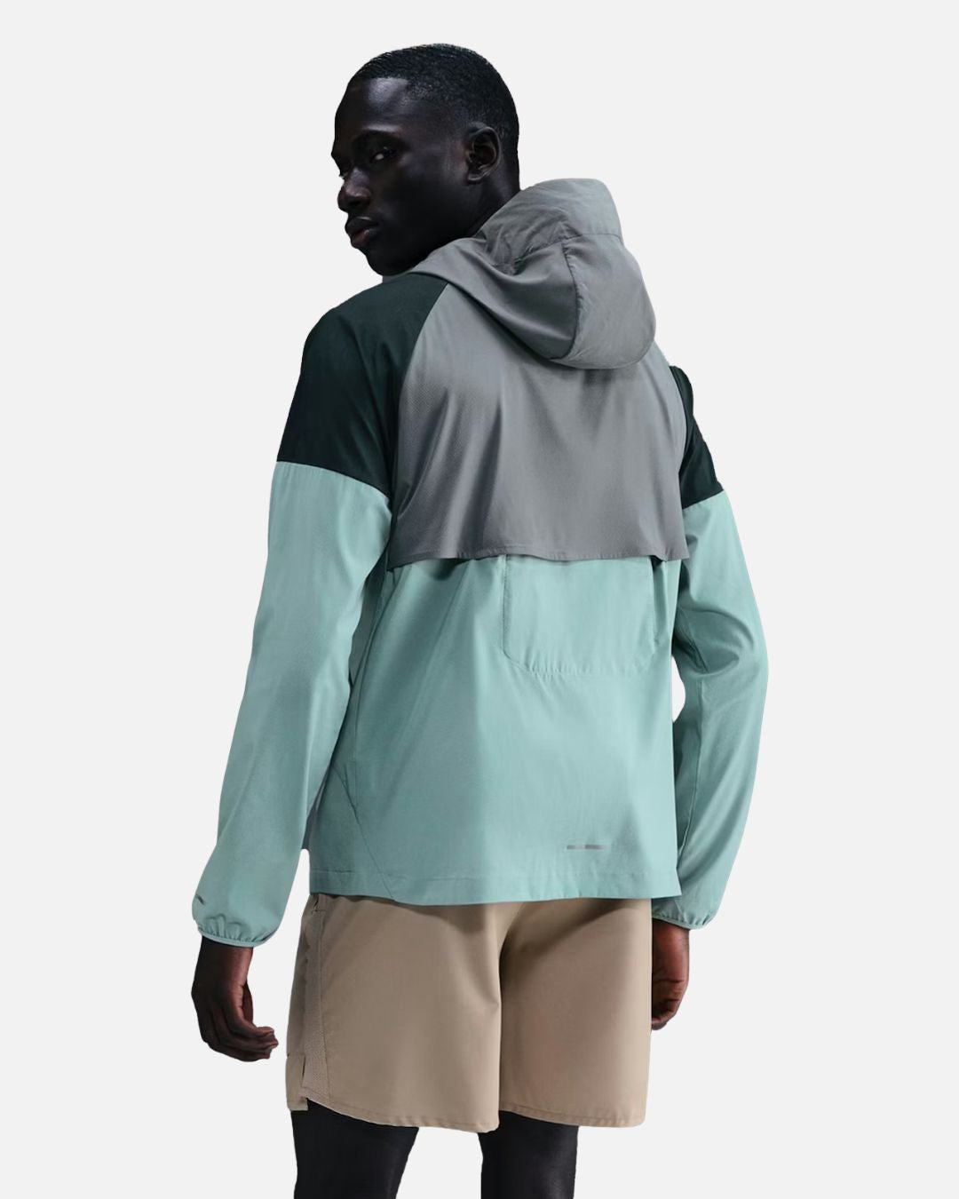 FootkornerVeste de survêtement Nike Impossibly Light Windrunner - Gris/Vert