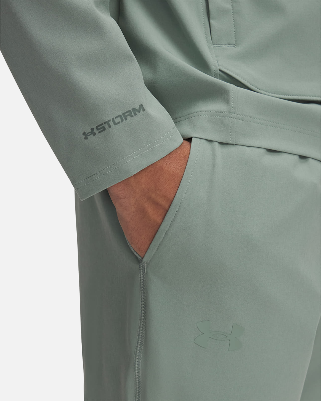 FootkornerTrainingsjacke Under Armour Running Outrun The Storm – Grün
