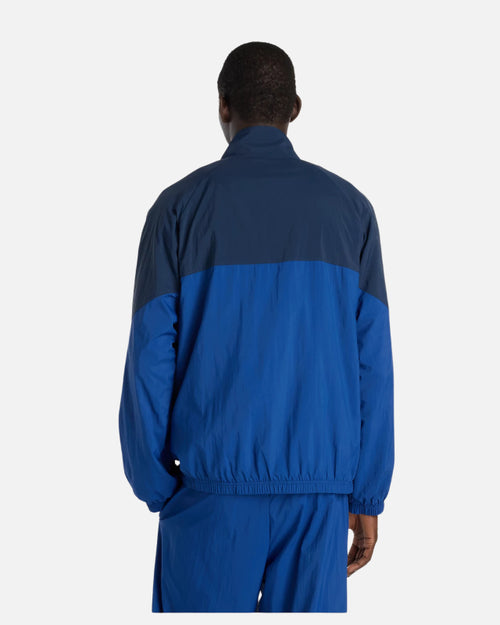 Veste New Balance Sport Legacy - Bleu - Footkorner