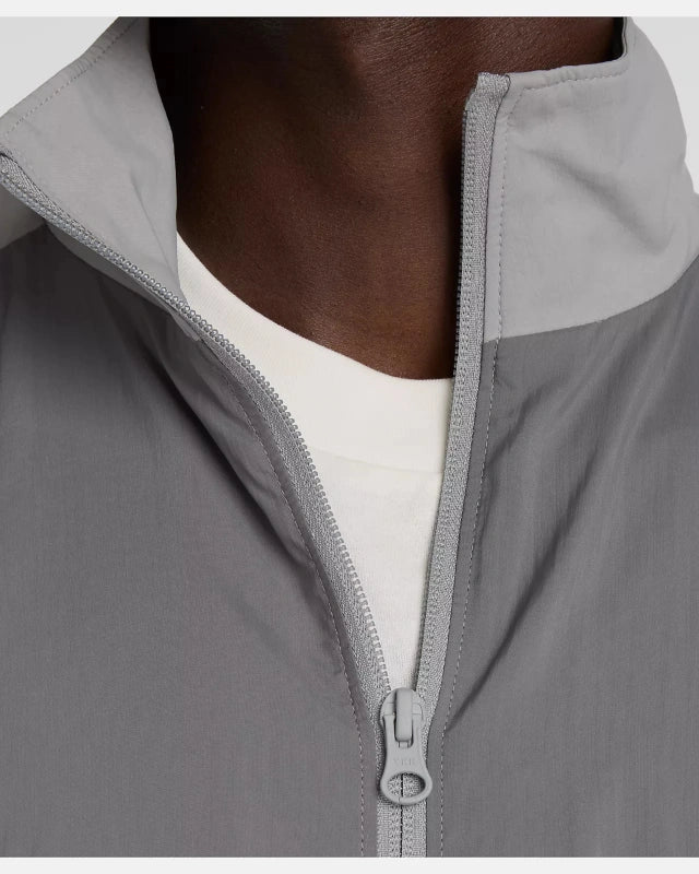 FootkornerVeste New Balance Sport Legacy - Gris