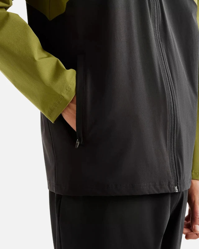 Footkornerutility stretch woven jacket in {Color}