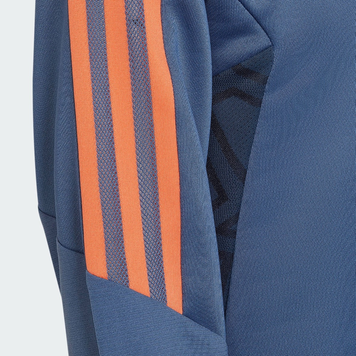 FootkornerManchester United Junior 2022/2023 training top - Blue/Orange