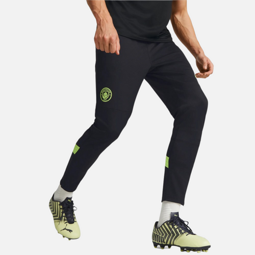Pantalón de entrenamiento Manchester City 2022/2023 - Negro/Amarillo - Footkorner