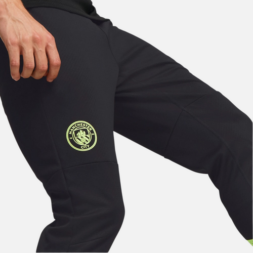 Pantalón de entrenamiento Manchester City 2022/2023 - Negro/Amarillo - Footkorner