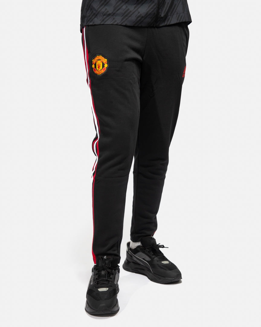 Pantalon d'entrainement Manchester United 2022/2023 - Noir/Rouge/Blanc