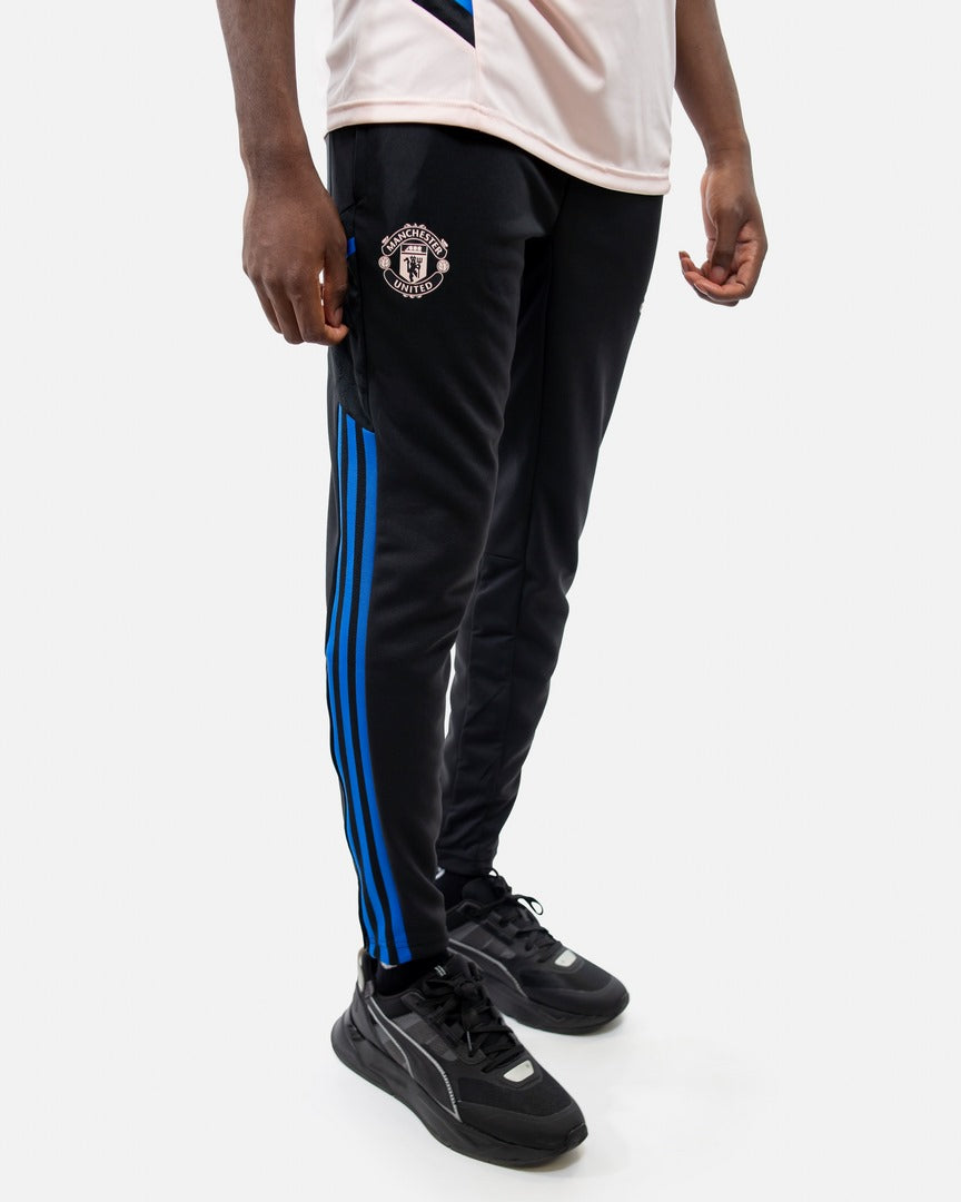 Pantalon d'entrainement Manchester United 2022/2023 - Noir/Bleu/Beige