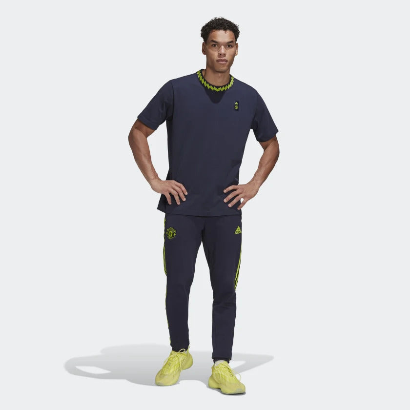 FootkornerPantaloni da allenamento Lifestyler del Manchester United - Blu/Verde 