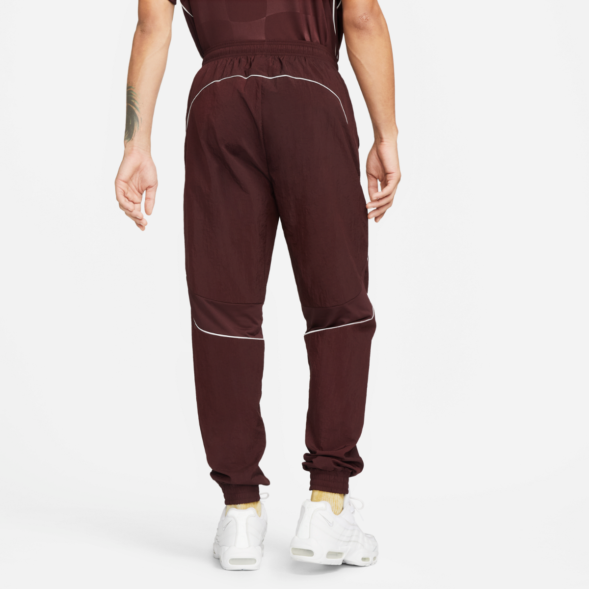 Pantaloni da jogging in tessuto Nike FC - Borgogna