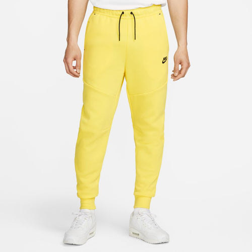 Joggers Nike Tech Fleece - Amarillo/Negro - Footkorner