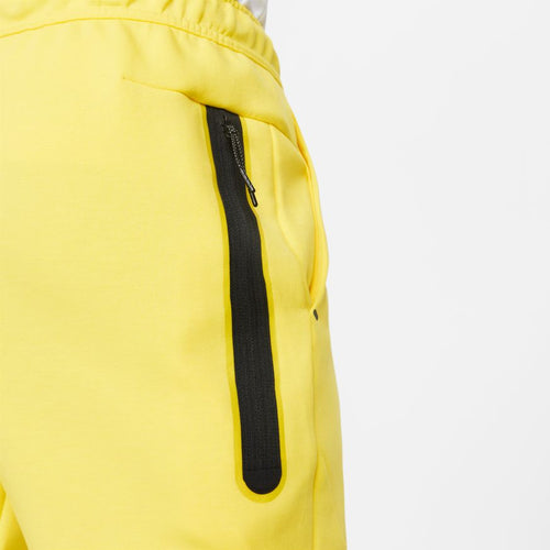 Joggers Nike Tech Fleece - Amarillo/Negro - Footkorner
