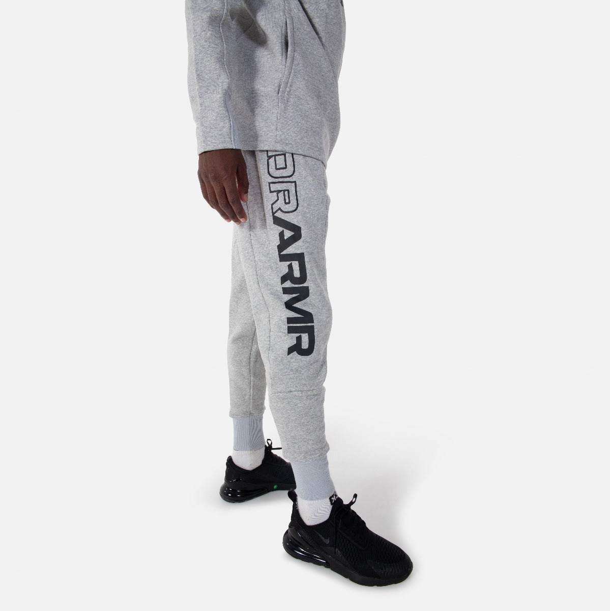 FootkornerPantalón Under Armour Baseline - Gris