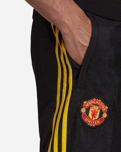 Pantaloni della tuta Manchester United Icon - Nero/Giallo - Footkorner