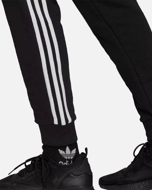 Pantalon 3 Stripes Manchester United 2021/2022 - Noir/Blanc - Footkorner