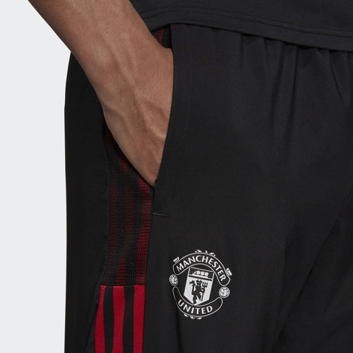 Pantalon Survêtement Manchester United 2021/2022 - Noir/Rouge - Footkorner