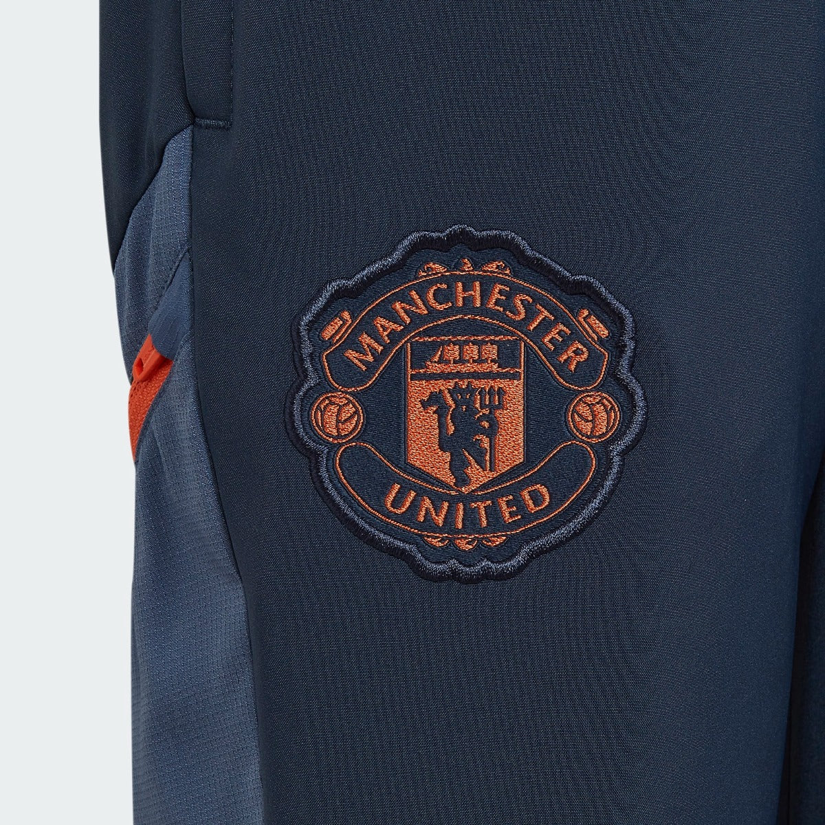 FootkornerManchester United Juniors Track Pants 2022/2023 - Blue/Orange