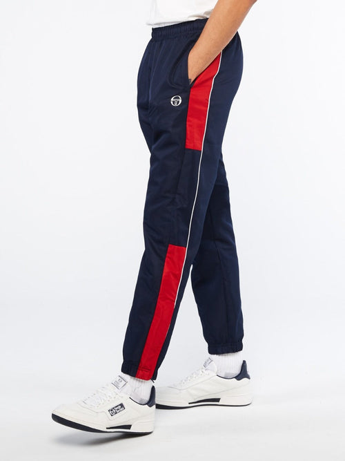 Pantalon survêtement Sergio Tacchini ABITA - Bleu/Rouge - Footkorner