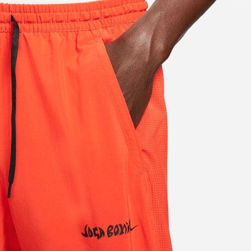 Pantalon tissé Nike FC Joga Bonito - Rouge/Noir - Footkorner