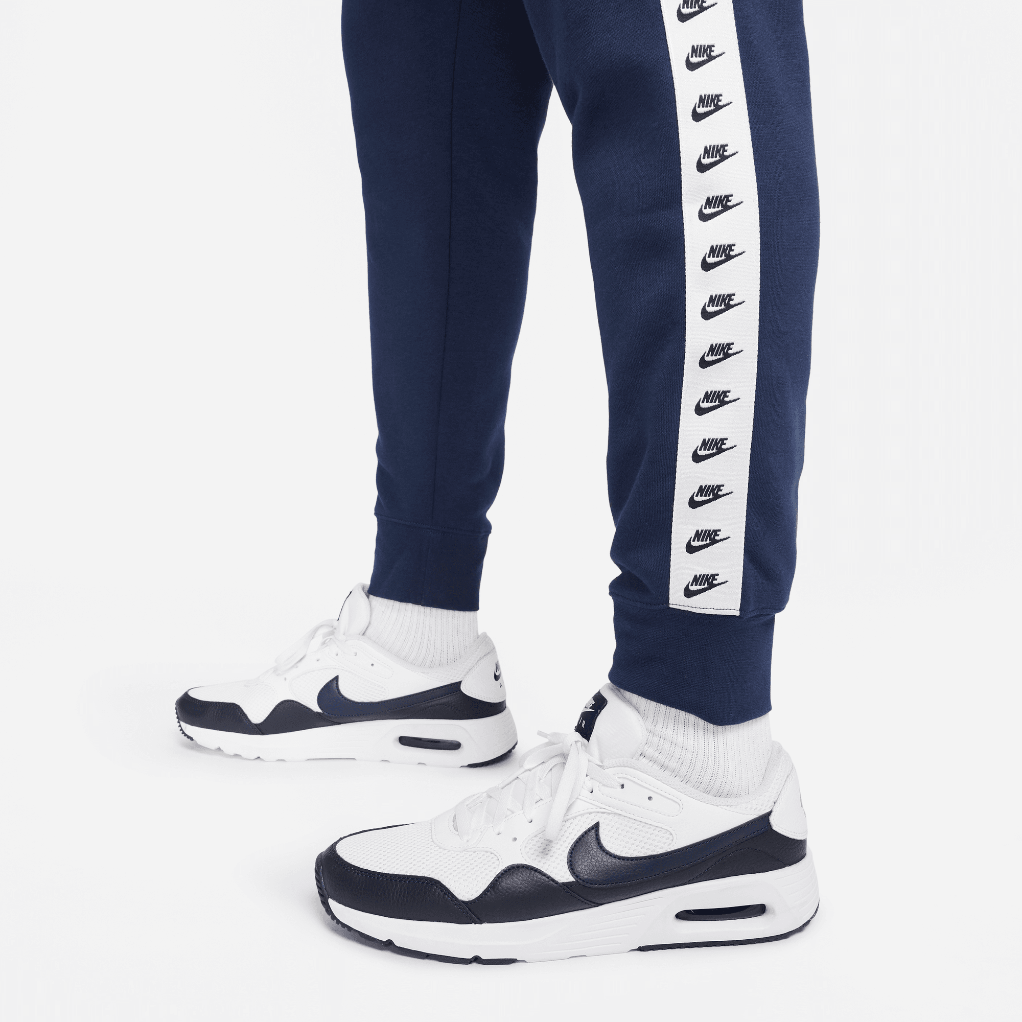 FootkornerNike Sportswear Essential Trainingsanzug – Blau