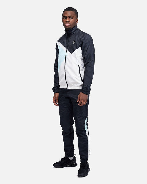 Trainingsanzug Sergio Tacchini Scaleno - Schwarz/Blau/Weiß - Footkorner
