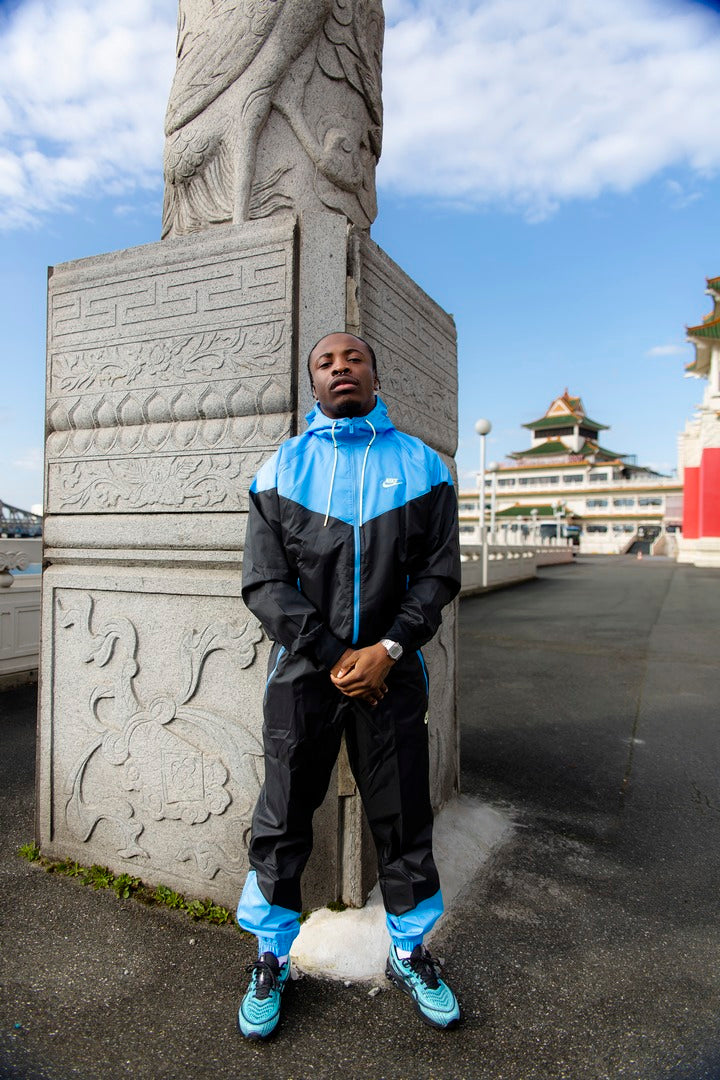 FootkornerCortavientos Nike Sportswear Windrunner - Negro/Azul
