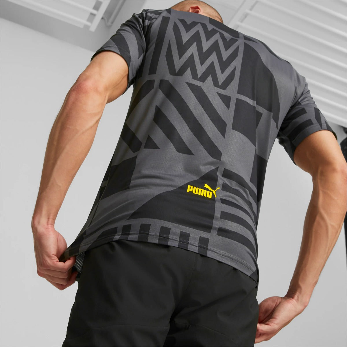 FootkornerCamiseta previa al partido del Manchester City 2022/2023 - Gris/Negro/Naranja