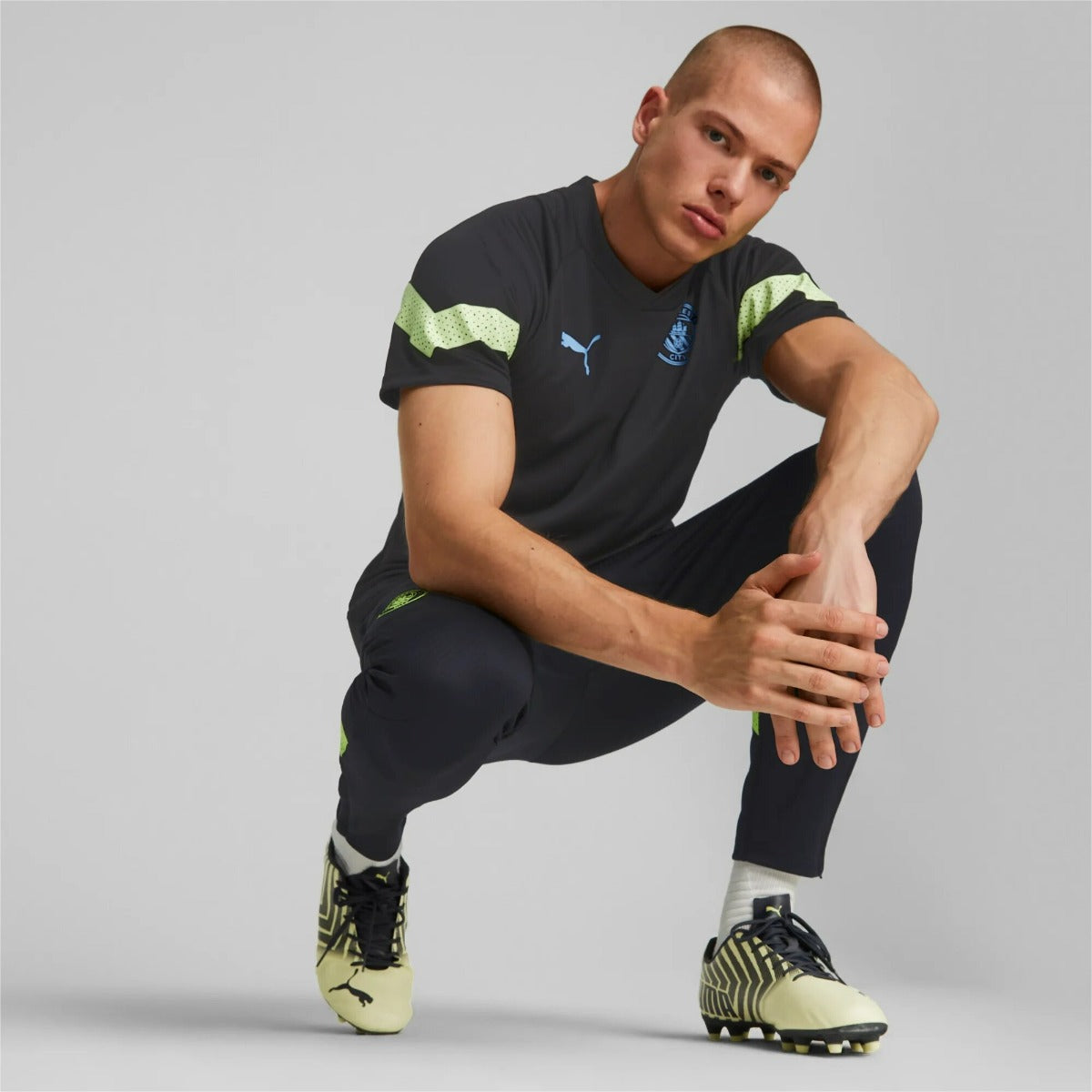 FootkornerCamiseta de entrenamiento Manchester City 2022/2023 - Negro/Amarillo