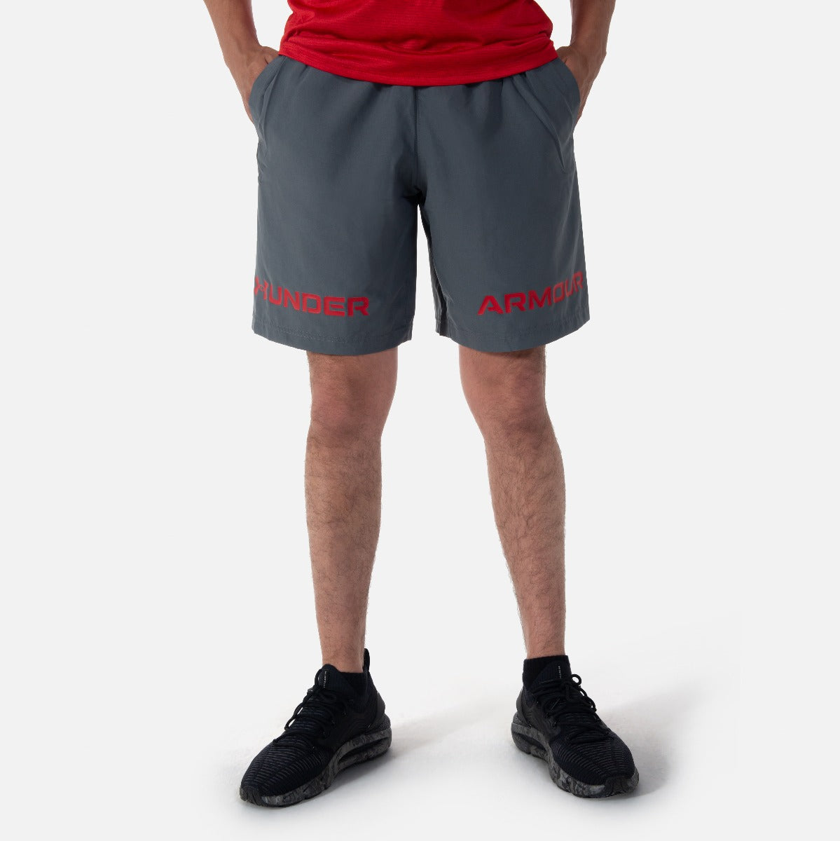 FootkornerPantalón corto Under Armour Woven Graphic - Gris/Rojo